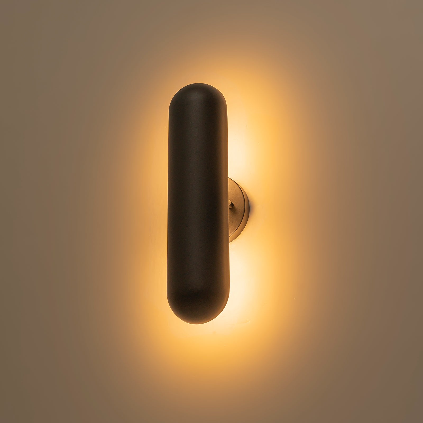 Glowlings 1-Light Modern Minimalist 16"High IP54 Matte Black Pill-Shaped LED Outdoor Wall Sconce