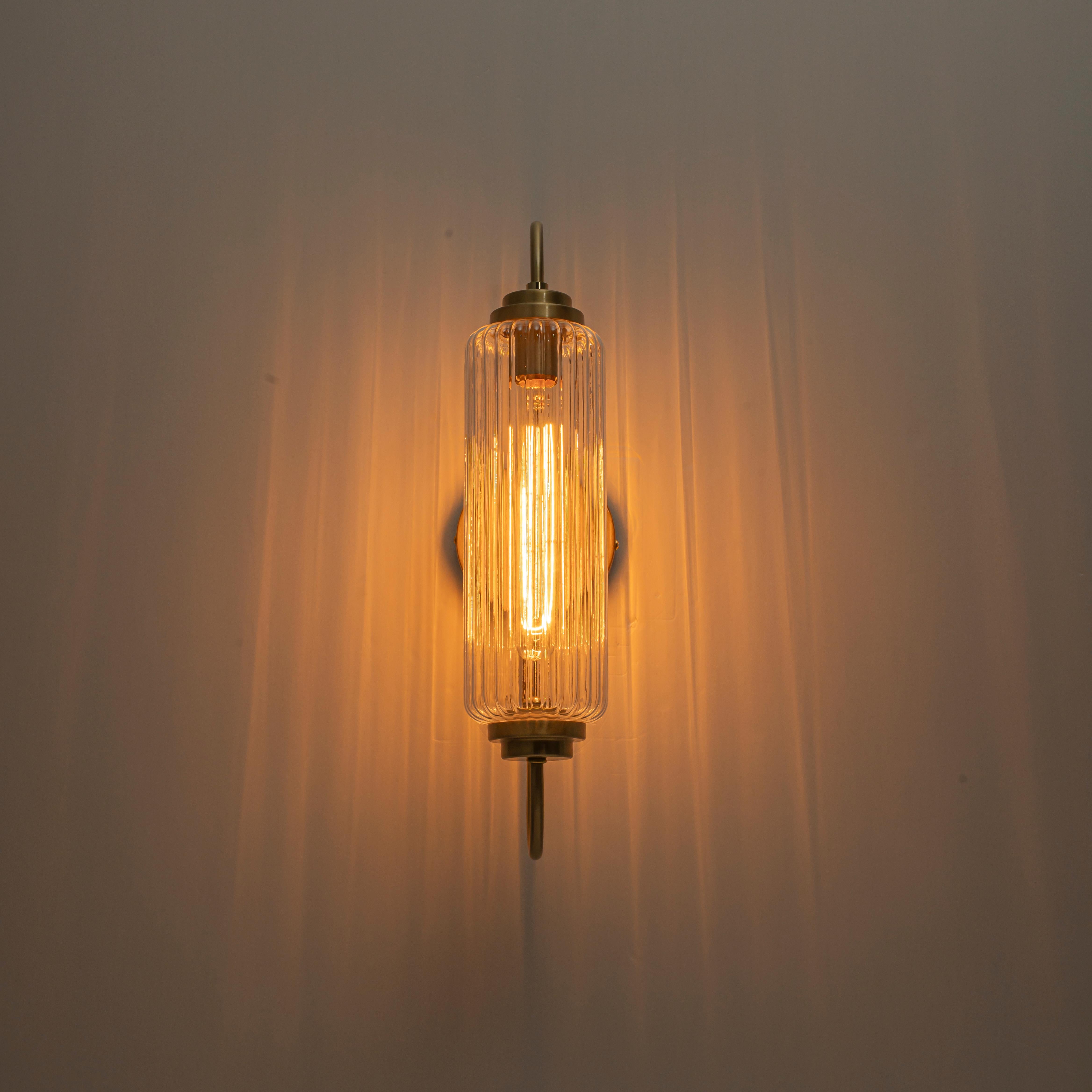 Glowlings 1-Light Modern Brushed Brass Cylinder Ribbed Fluted Glass Wall Sconce