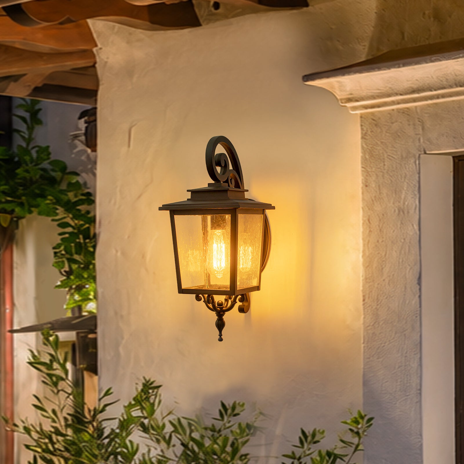 Glowlings 1-Light Traditional Lantern Outdoor Wall Sconce with Seeded Glass and Scroll Accent