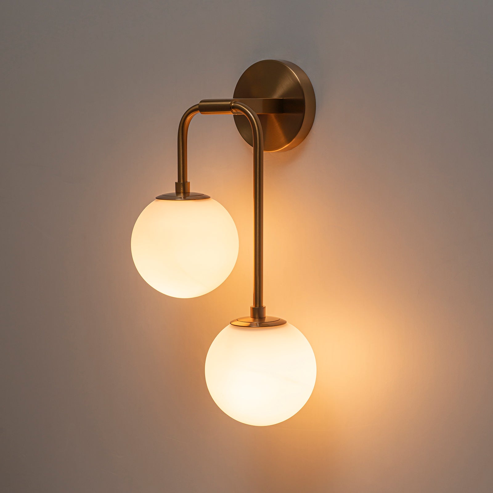 Glowlings 2-Light Modern Brass Wall Sconce, Brushed Gold Globe Vanity Light with Opal Glass Shades