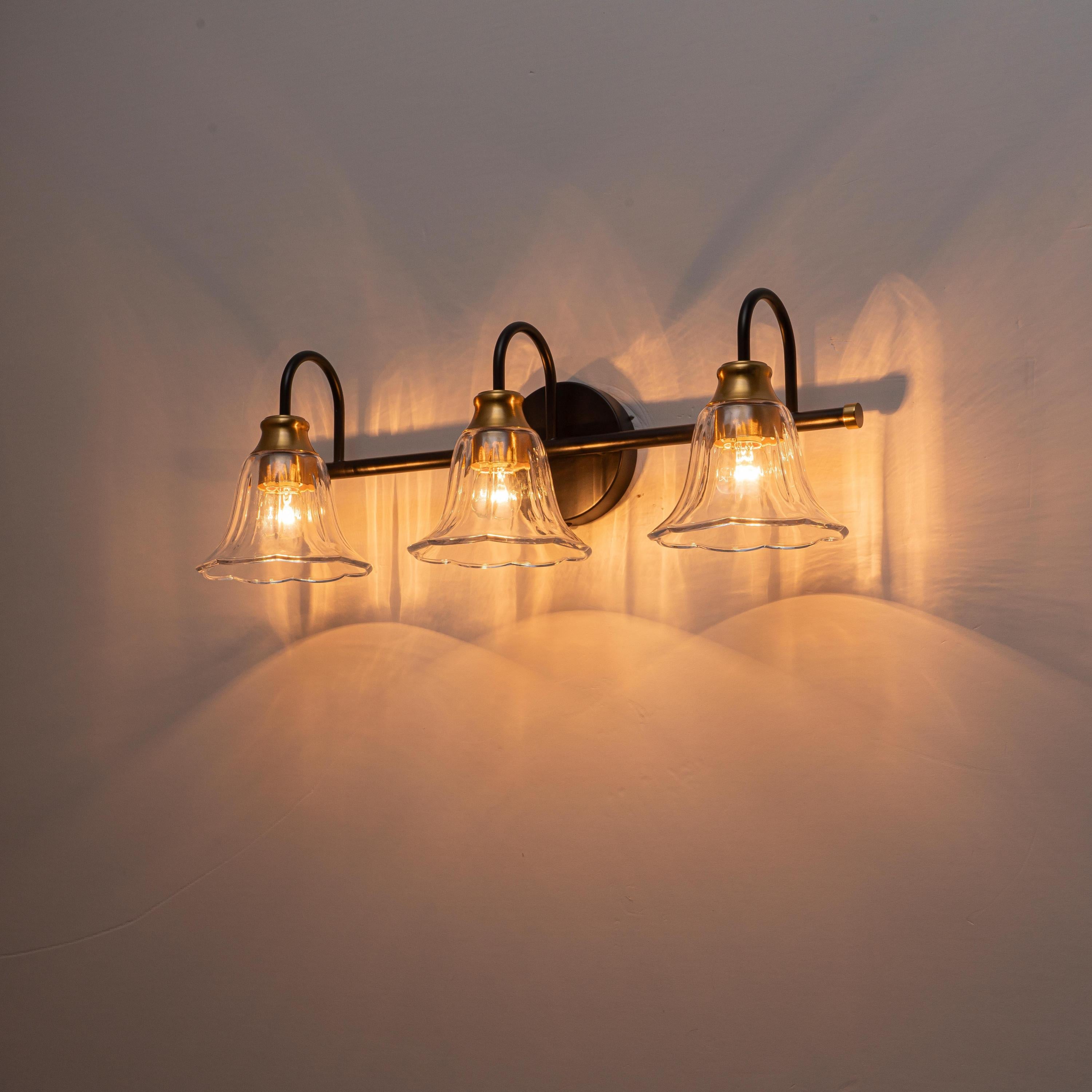 Glowlings 3/4-Light Modern Black & Gold Bathroom Vanity Light Wall Sconce with Flower Clear Glass Shades for Mirror