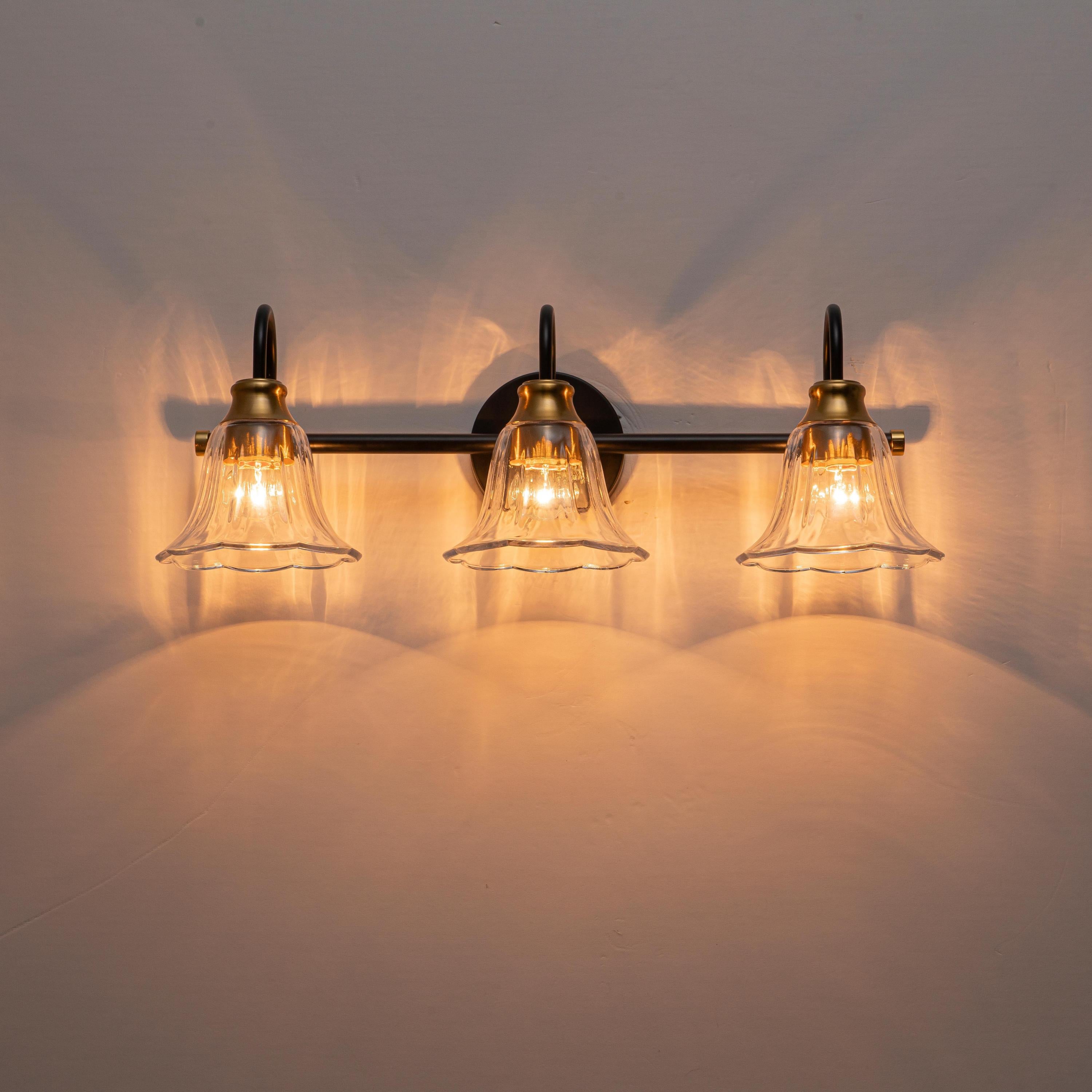 Glowlings 3/4-Light Modern Black & Gold Bathroom Vanity Light Wall Sconce with Flower Clear Glass Shades for Mirror