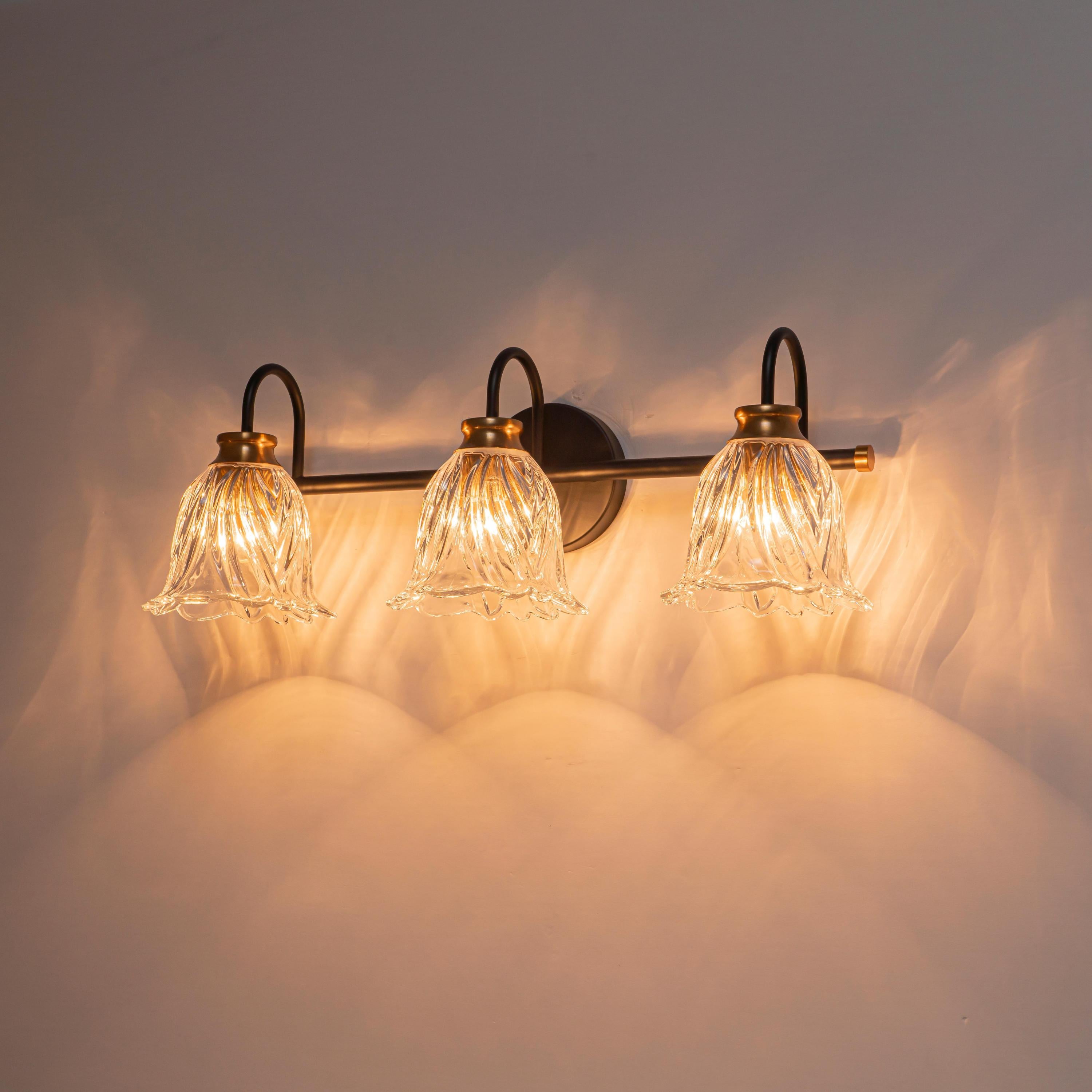 Glowlings 3/4-Light Modern Black & Gold Bathroom Vanity Light Wall Sconce with Flower Clear Glass Shades for Mirror
