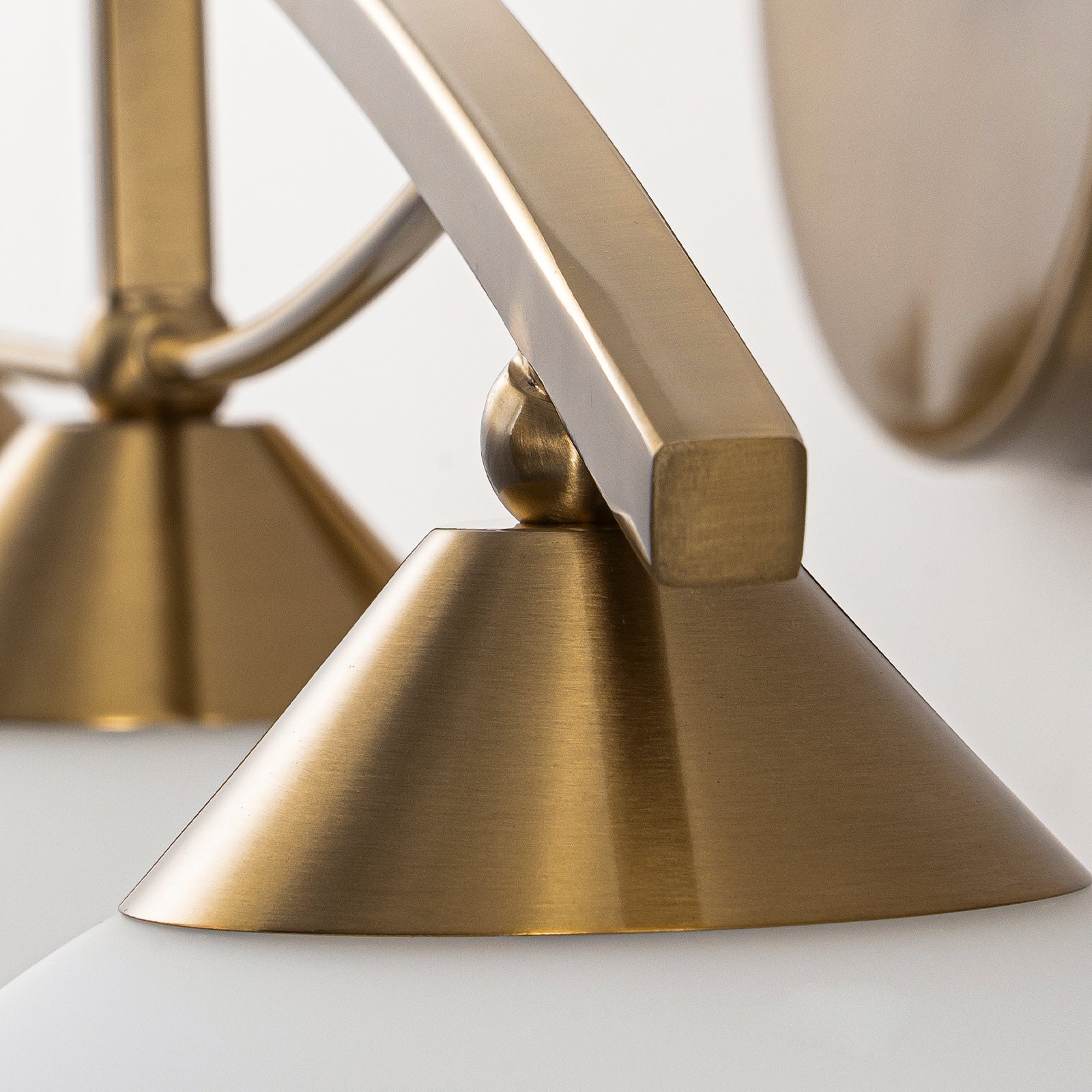 Glowlings 3/4-Light Modern Brass Curve Opal Glass Bathroom Vanity Light