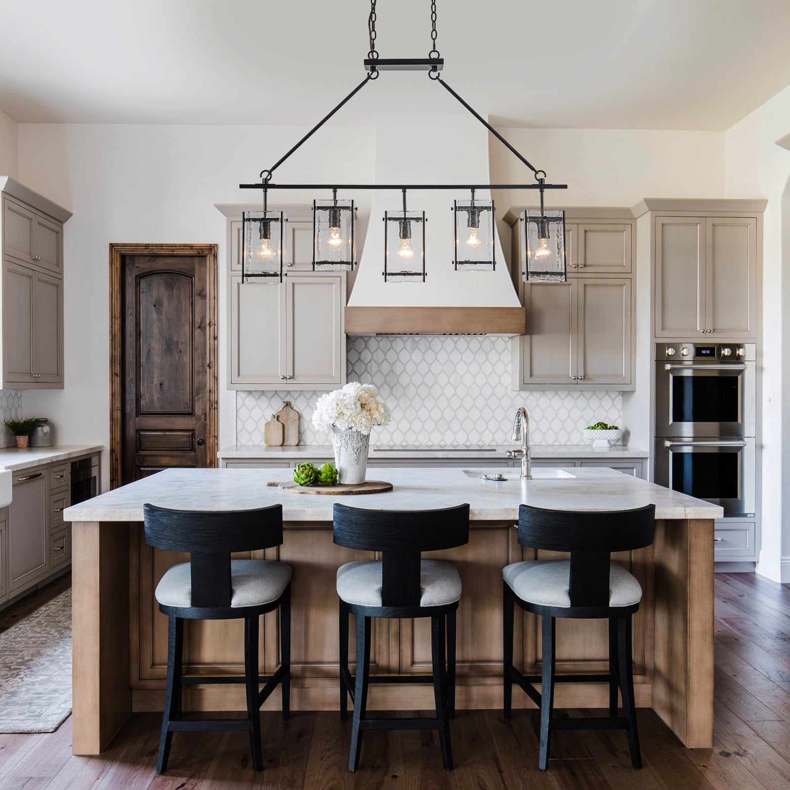 Glowlings 5-Light Modern Kitchen Island Chandelier, Matte Black Linear Pendant Light with Handblown Water Ripple Glass