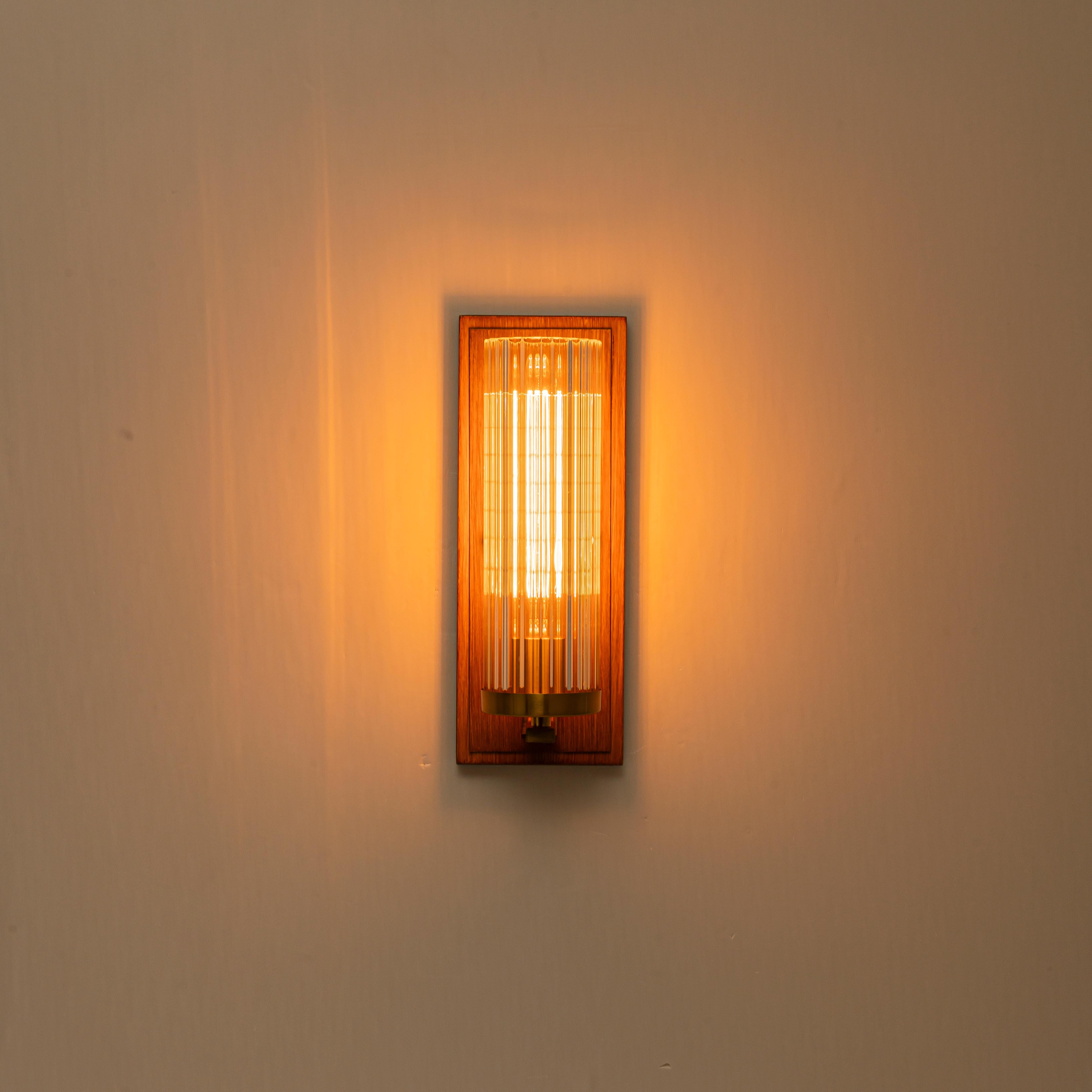 Glowlings 1-Light Brushed Gold Indoor Wood Wall Sconce with Cylinder Ribbed Fluted Glass Shade