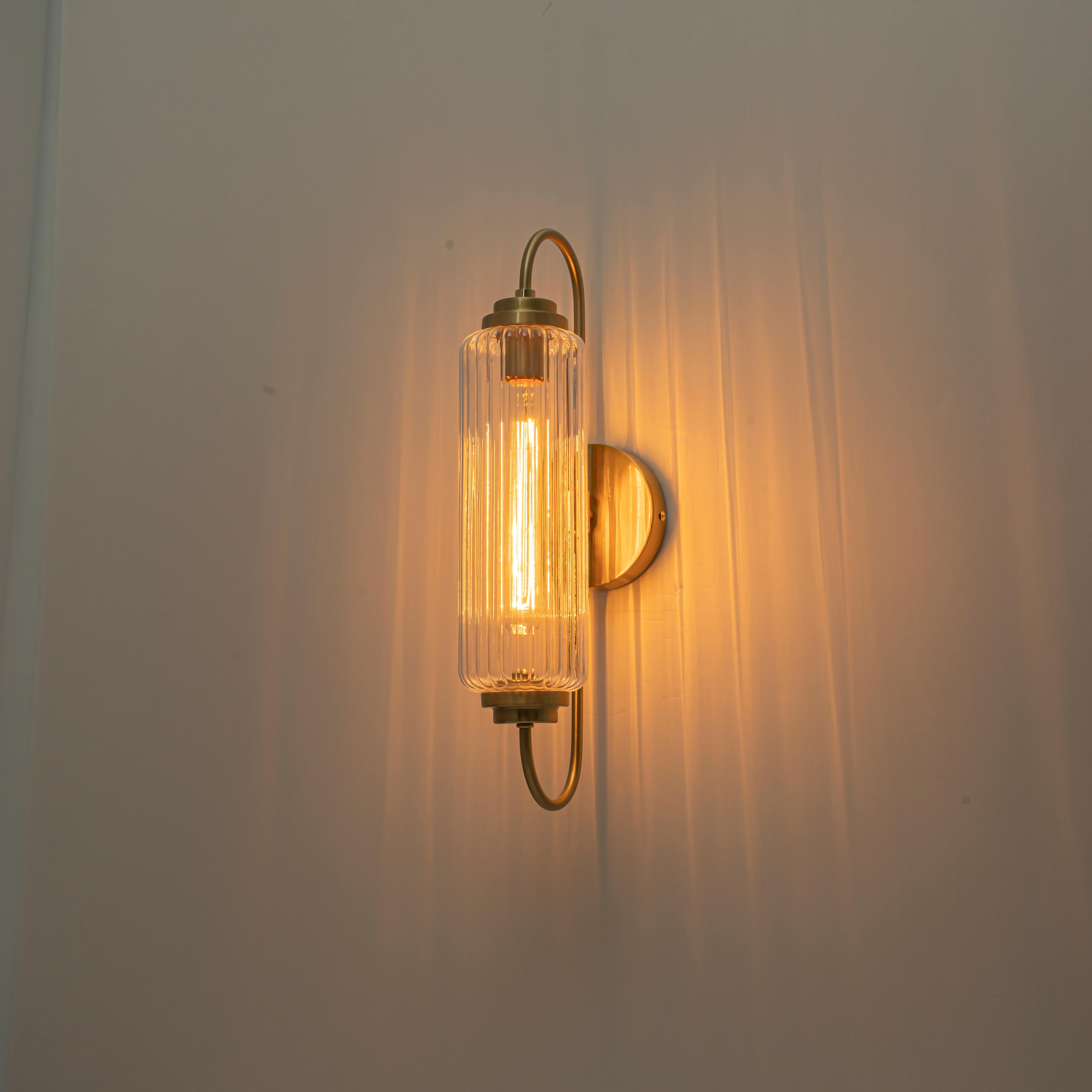 Glowlings 1-Light Modern Brushed Brass Cylinder Ribbed Fluted Glass Wall Sconce