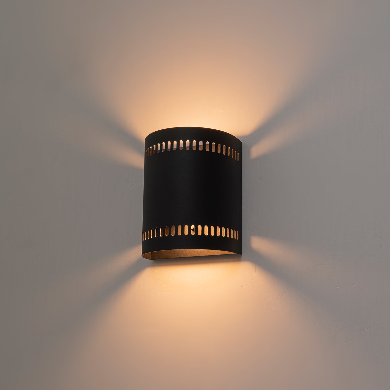 Glowlings 1-Light Modern 7"High IP56 Matte Black Cylinder Punched Hole Outdoor LED Wall Sconce