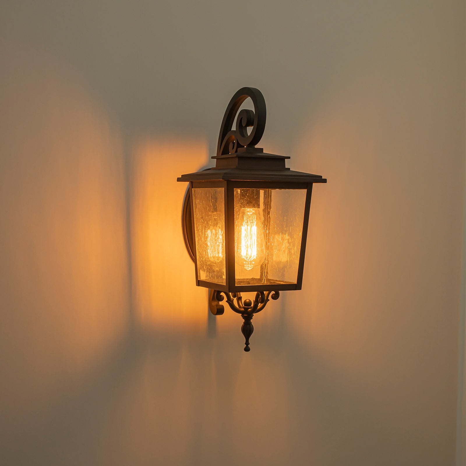 Glowlings 1-Light Traditional Lantern Outdoor Wall Sconce with Seeded Glass and Scroll Accent