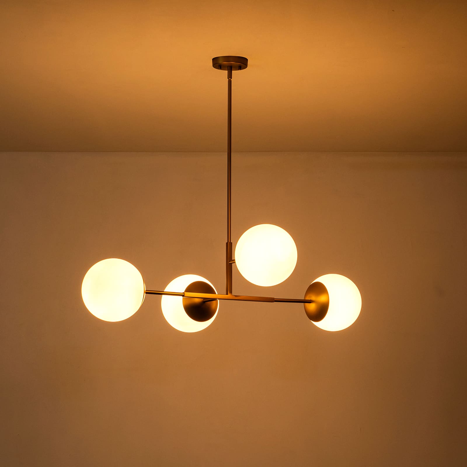 Glowlings 4-Light Modern 43"Wide Large Opal Glass Globe Brass Linear Pendant Light