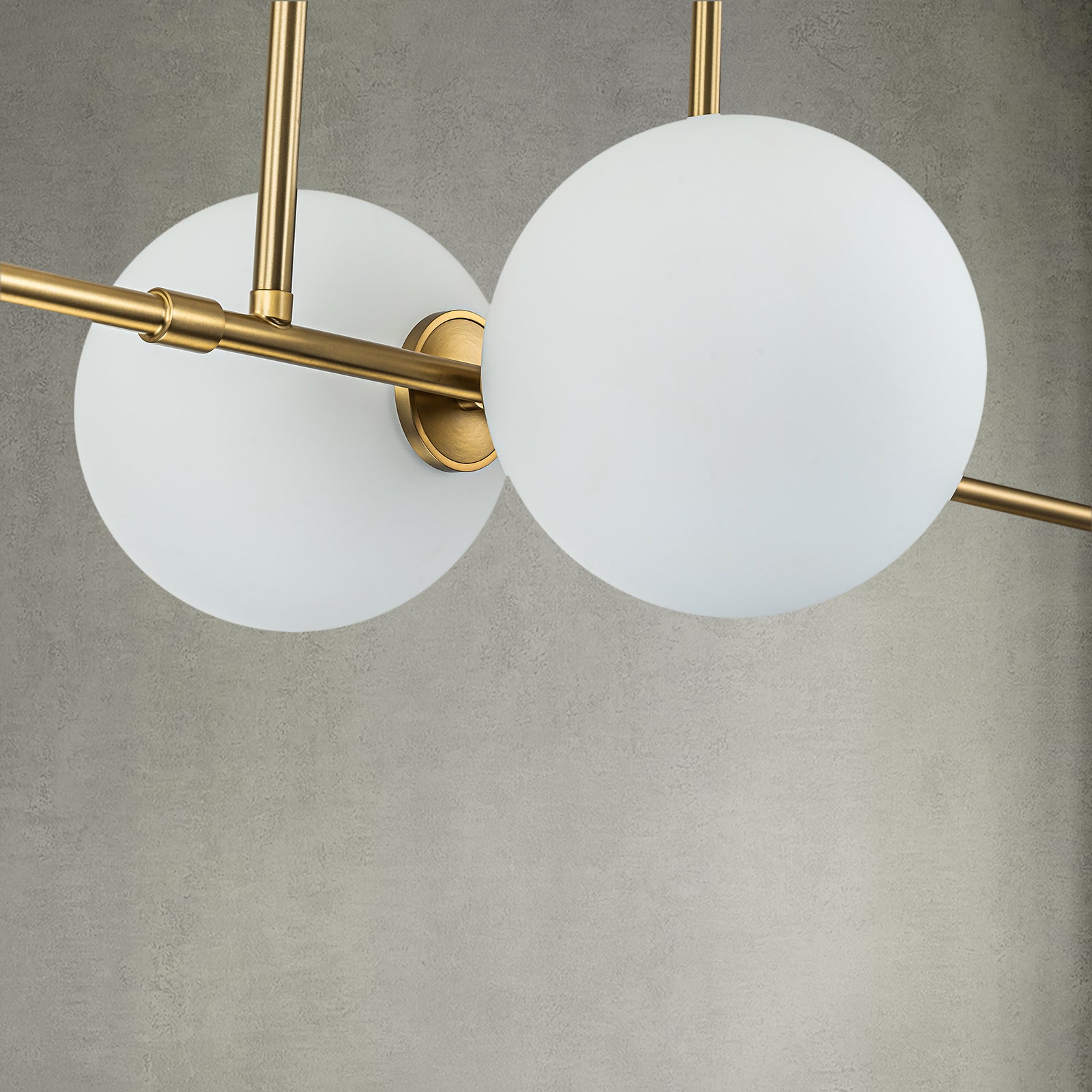Glowlings 4-Light Modern Glam Globe Opal Glass Aged Brass Linear Pendant Light